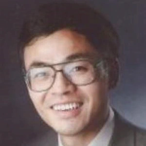 Professional headshot of Shu-Guang Li